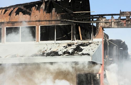 Expert Witness and Loss Consulting. An image of a burned building.