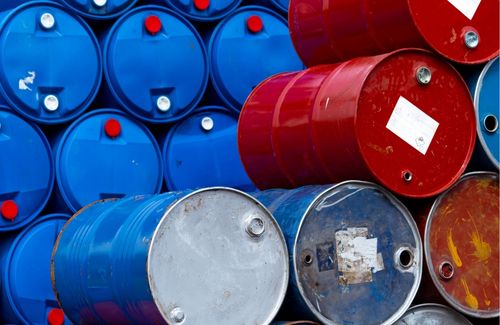 Hazardous Materials Compliance Consulting. Image of barrels of chemicals.
