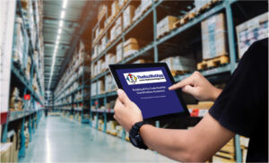 Image of a Logistics Warehouse, Engineer holding an ipad. 