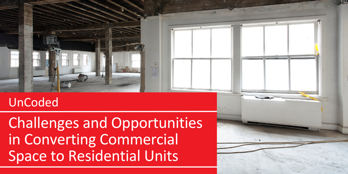 A building under remodel showing open ceiling and building materials.