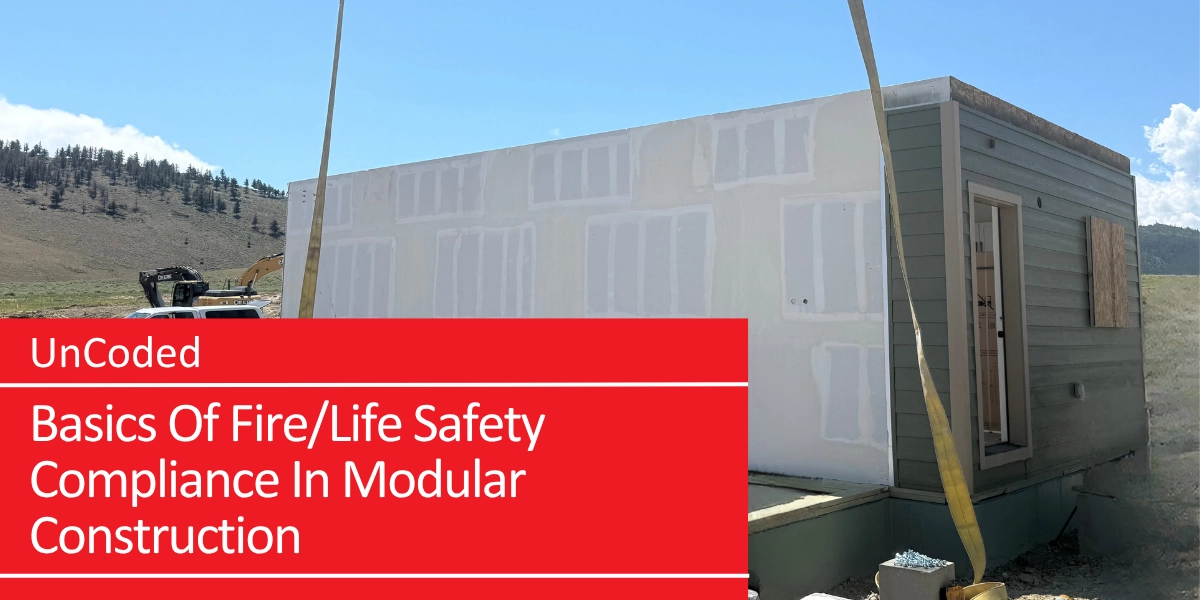 Image of a partially completed modular two-story house.